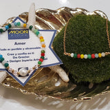 ﻿Combinación de cadena alambrada a mano con cristales y pulsera elástica en cristales con una perla original de agua dulce.